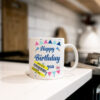 "Happy Birthday" (Funny Fake Reduced Joke Mug) Kitchen Top View Joke Cup